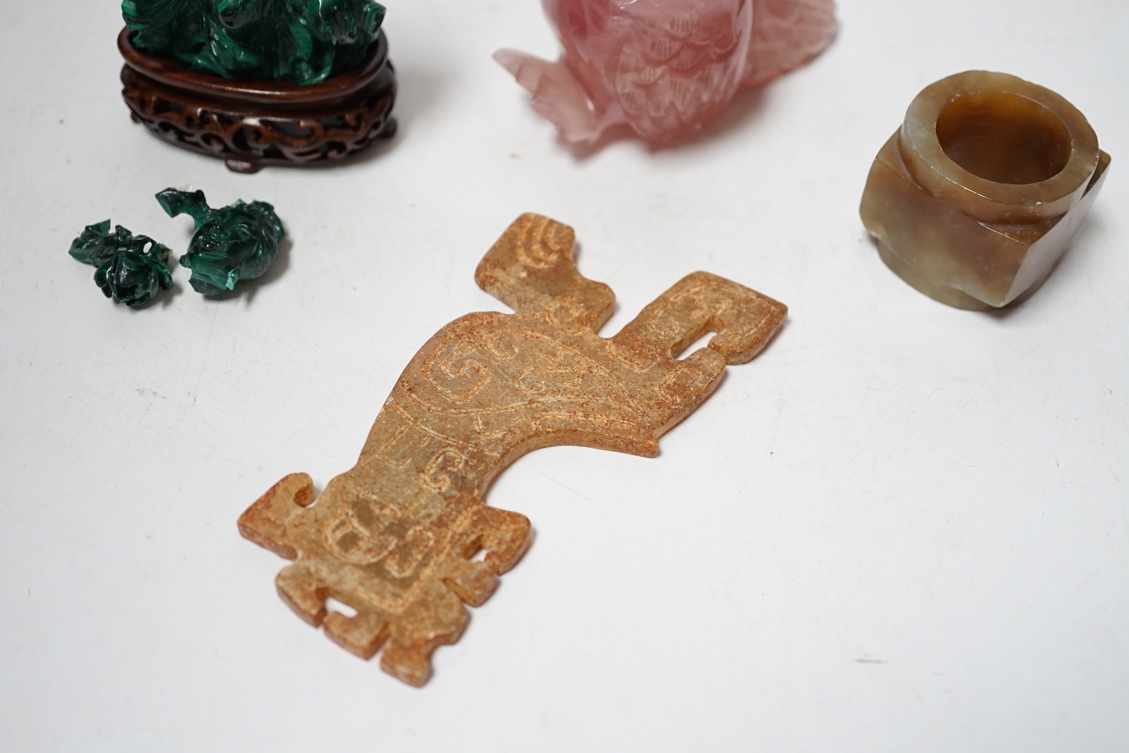 A group of Chinese hardstone carvings and a soapstone cong, largest 10.5cm